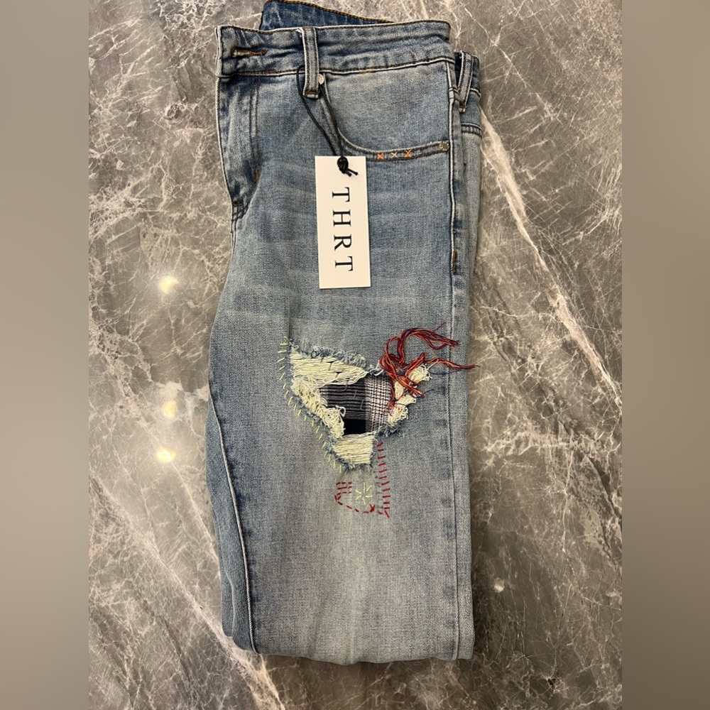 Thrt denim blue jeans with rip. Brand new never worn